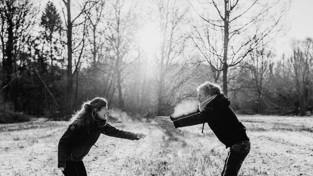 Friends playing in the snow.
