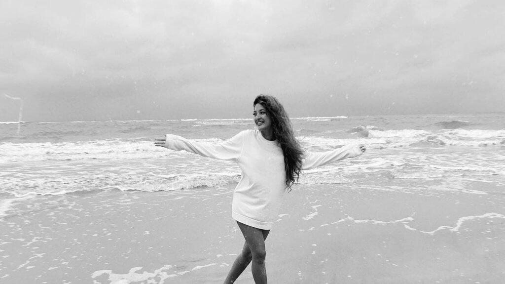 Girl in the ocean.