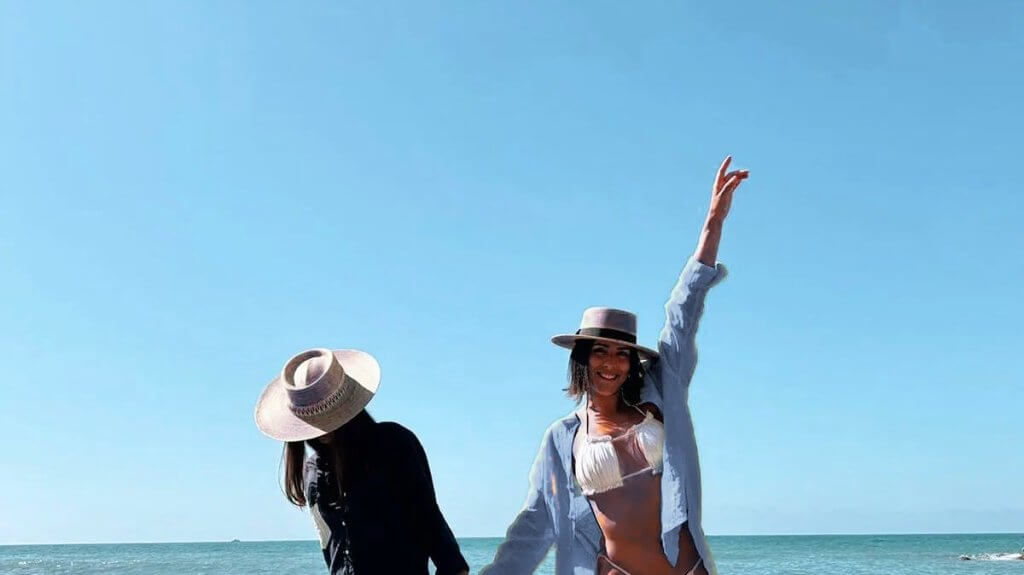 Same gender couple at the beach.
